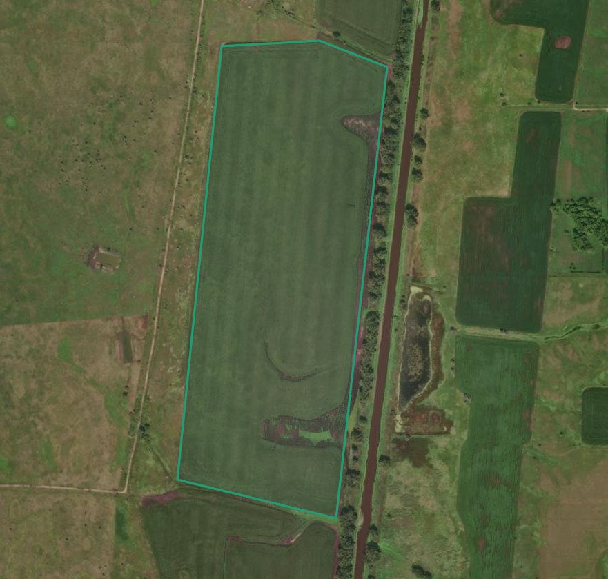Satellite view of a field with a mapped Varigro boundary.